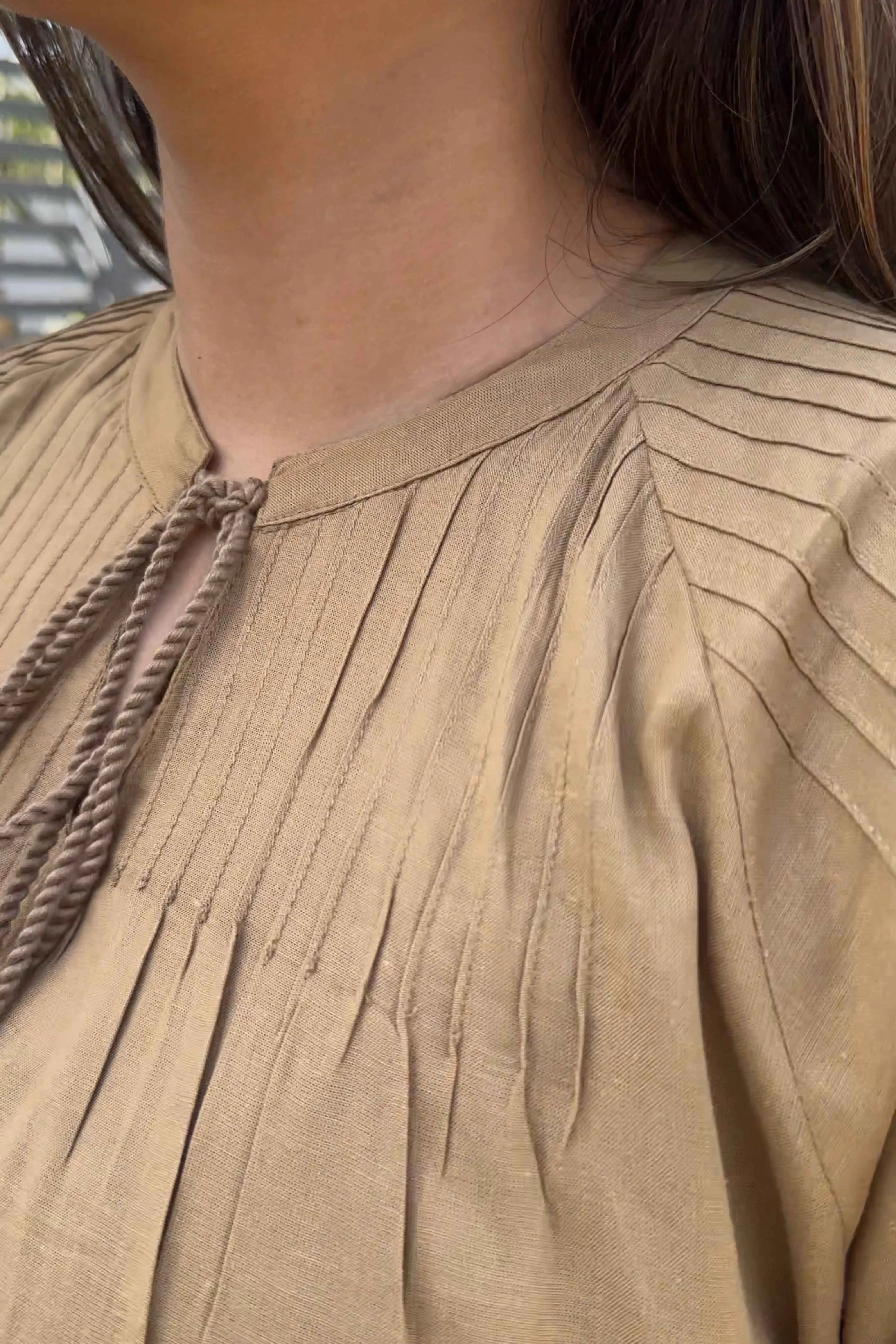 Side drape and silhouette of brown tunic top — Brown Tunic Top