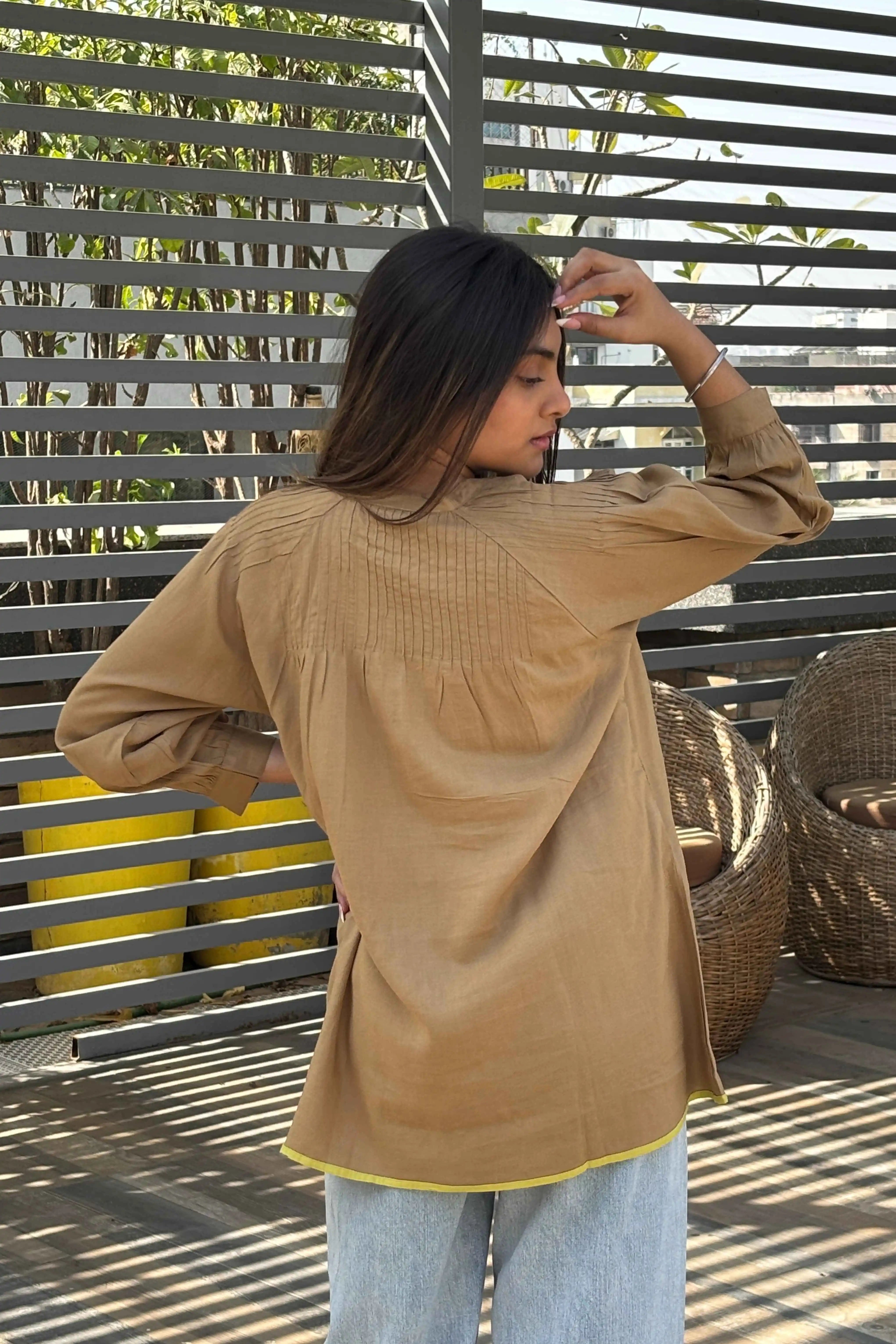 Fabric and fall detail in brown tunic top — Brown Tunic Top