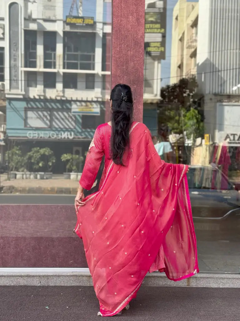 Fabric and fall detail in rani pink kurta set — Rani Pink Kurta Set