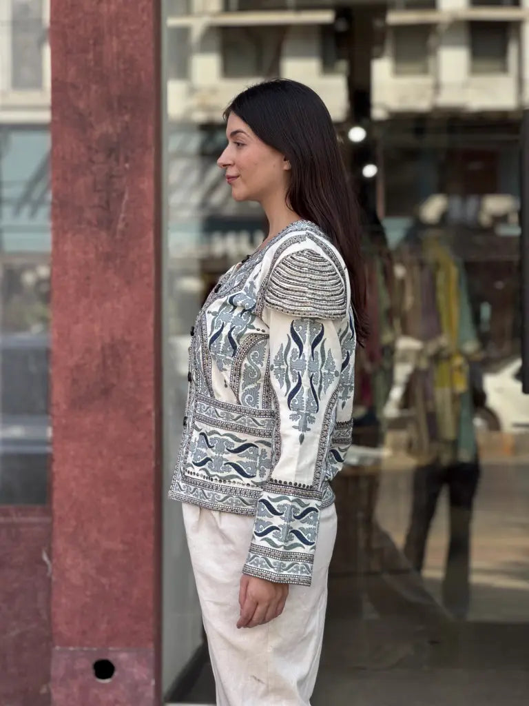 Side drape and silhouette of white jacket — White Jacket