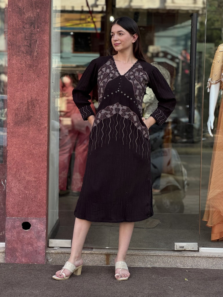 Fabric and fall detail in black dress — Black Dress