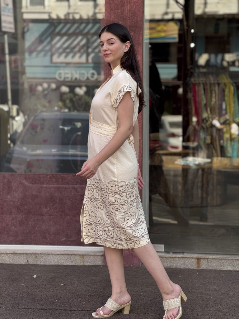 Fabric and fall detail in off white dress — Off White Dress