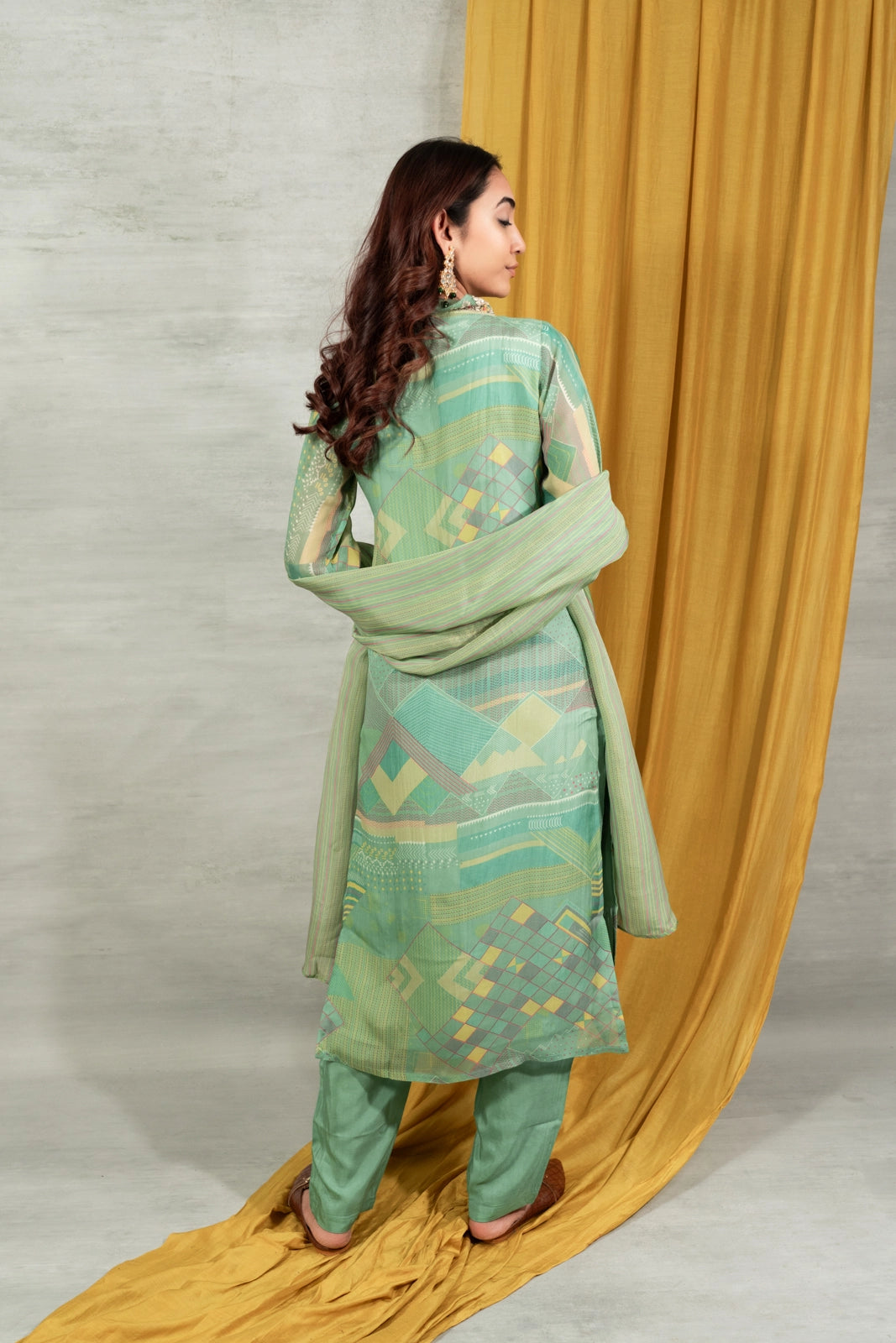Fabric and fall detail in green salwar suit — Green Salwar Suit