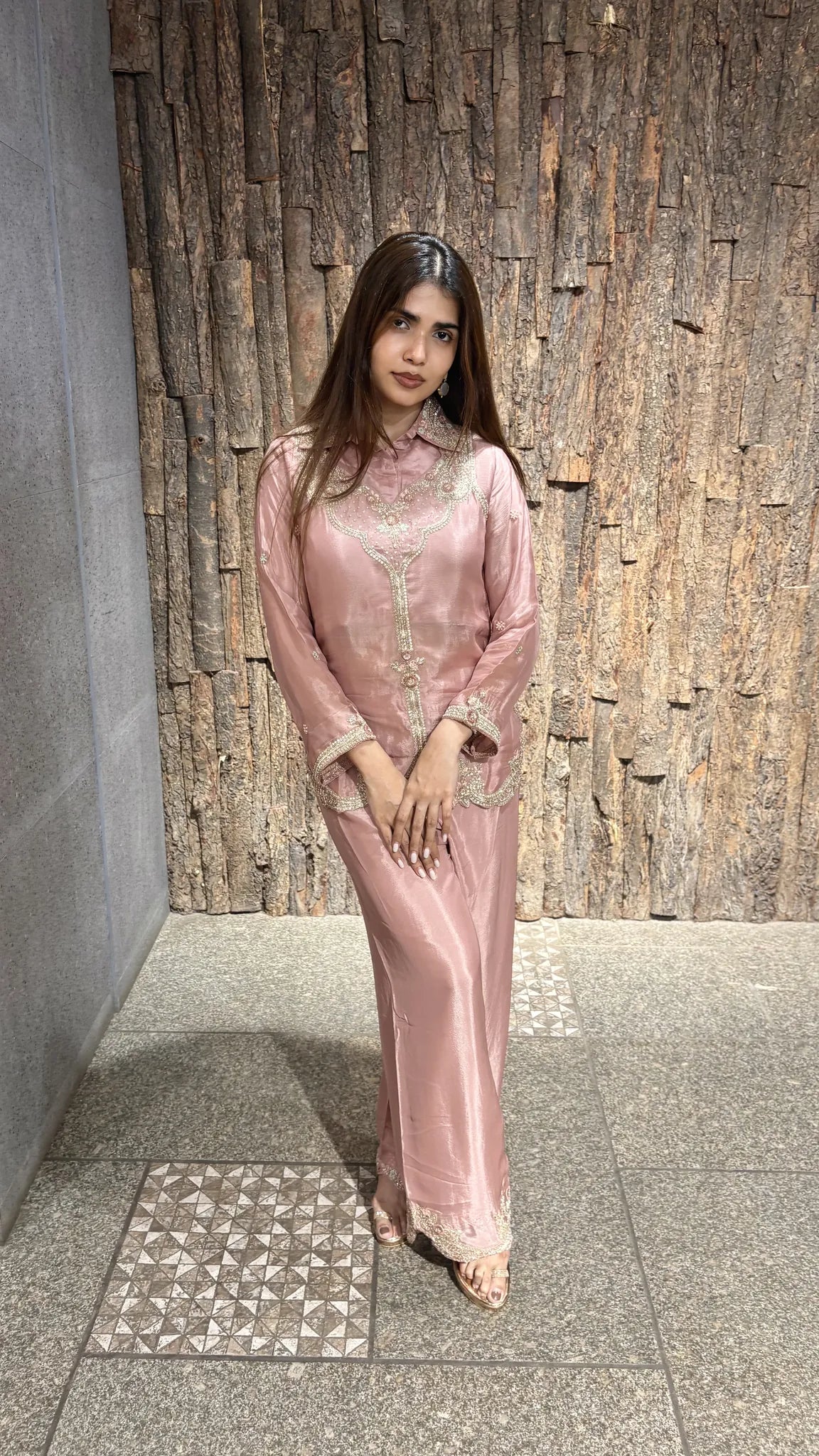 The same co-ord set in baby pink, the chinnon shirt and wide plazo worked with tonal thread embroidery and a lace edge.