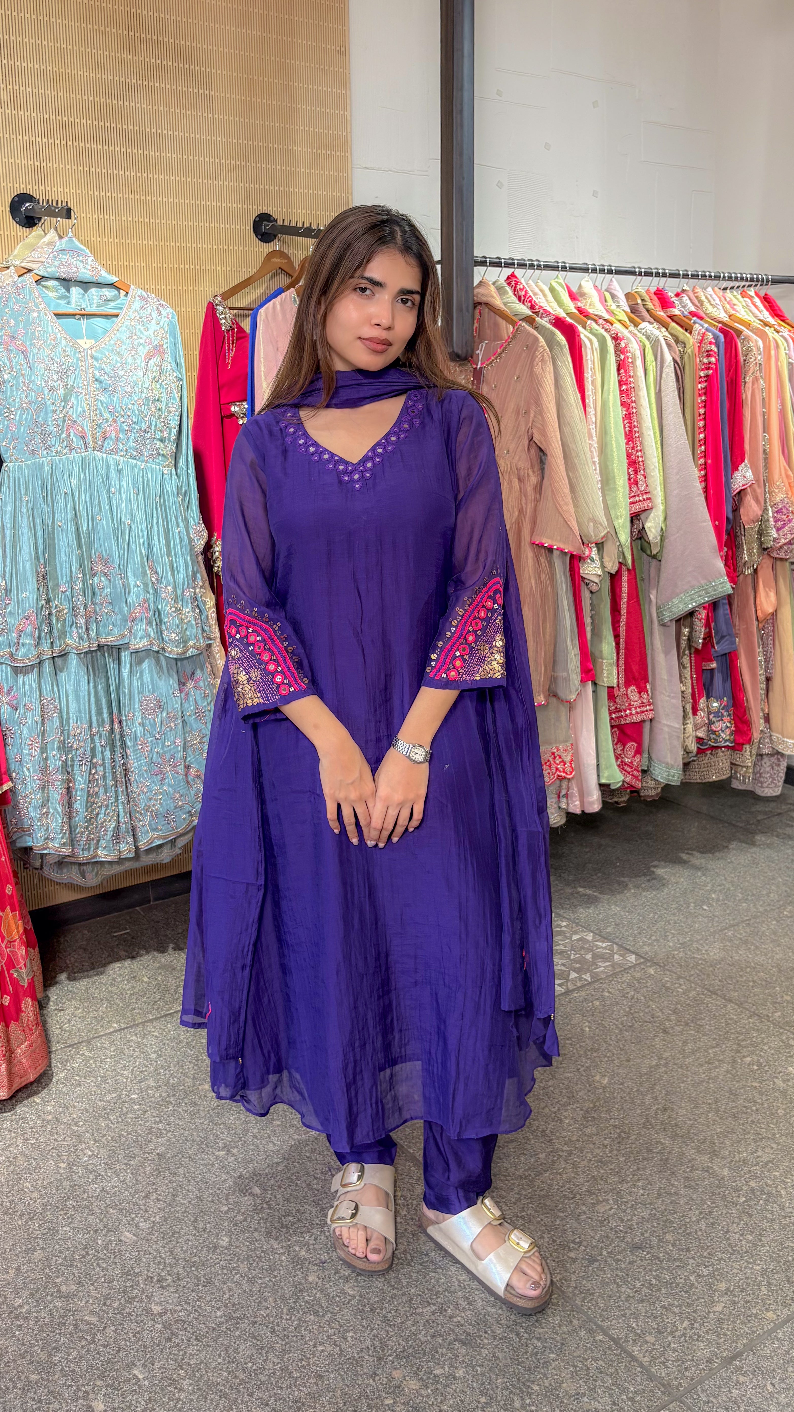 Violet mul chanderi A-line kurta with a matching pant and sheer dupatta, worn with a narrow band collar at the neck.